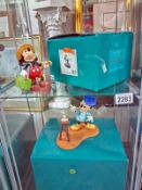 A boxed Disney WDCC 10th Anniversary creating a classic and 75th Anniversary Mr Mouse takes a trip