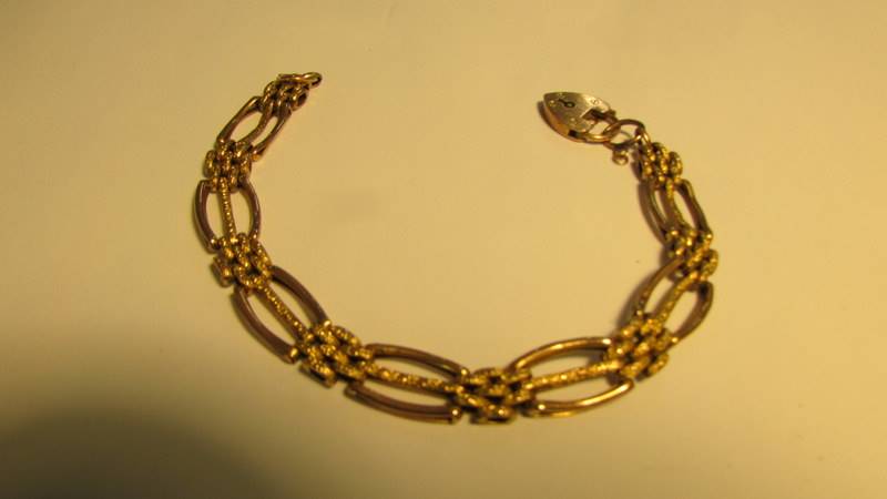 A 9ct gold bracelet with padlock, 9.9 grams. - Image 2 of 2
