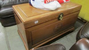 A large camphor wood blanket box with carved top, 104 x 53 x 61 cm tall, COLLECT ONLY,