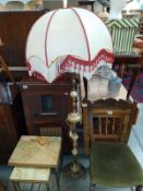 A vintage gilded white metal and Onyx floor standing standard lamp and shade. Height 148cm.
