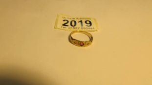 A yellow gold ring (Hall mark indistinct), size P, 1.8 grams.