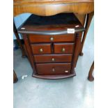 A dark wood stained lounge chest of drawers, magazine rack, side table and pot stand 36.5 x 42.5 x