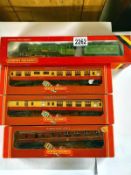 A Hornby R845 flying Scotsman and R148, R420, R475 Coaches