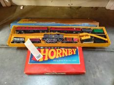 A Hornby 0 gauge goods train set no 20 and Dublo 00 gauge train set