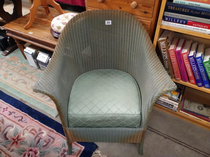 A Lloyd Loom Lusty arm chair. COLLECT ONLY.