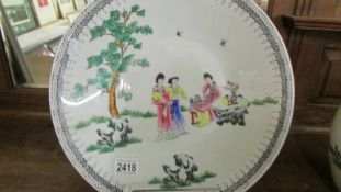 A large 'YT' Chinese charger decorated in Hong Kong, 36.5 cm diameter, COLLECT ONLY.