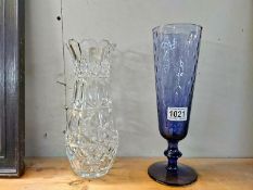 A heavy cut glass vase, 26 cm and a blue glass vase, 30 cm. COLLECT ONLY.
