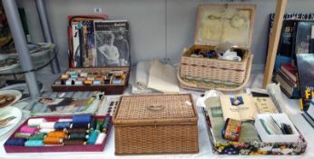 A quantity of haberdashery including threads, sewing boxes, buttons & vintage needle packages