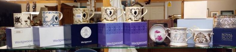 A mixed collection of mainly boxed Wedgwood China. (four shelves)