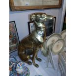 A large brass dog ornament of a greyhound. Height 56cm COLLECT ONLY.