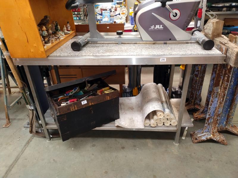 A granite top stainless steel kitchen work table. 150cm x 75cm x Height 87cm.