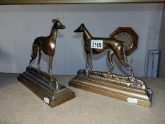 A pair of Victorian brass greyhound door stops