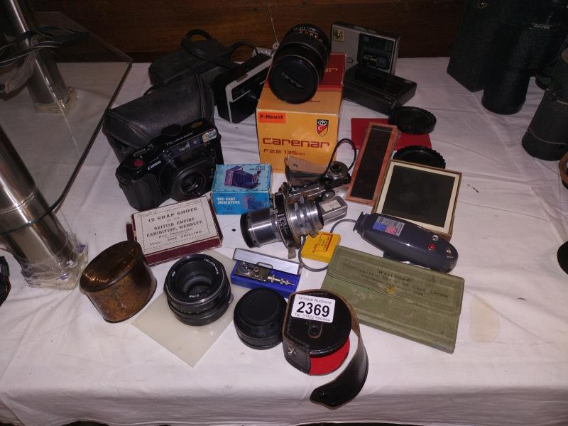 A boxed vintage camera equipment including lenses Canon Sure Shot 35mm etc.
