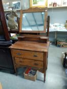 A 1930's oak dressing table. 76cm x 45cm x 79cm. Mirror height 151cm. COLLECT ONLY.