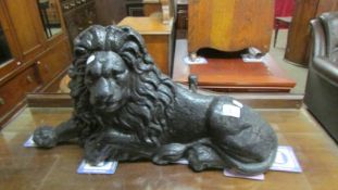 A large Victorian cast iron lion boot scraper, 69 x 34 cm x 30 cm deep, COLLECT ONLY.