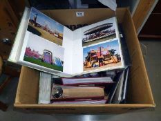 A quantity of photograph albums with photos.