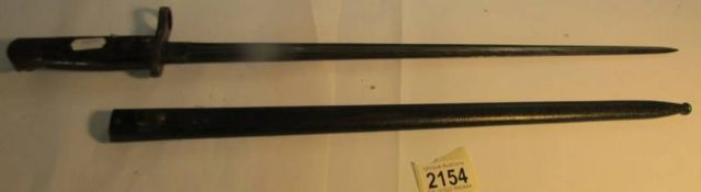 A WW1 Belgian bayonet in scabbard, 58 cm long. blade 45 cm. COLLECT ONLY