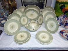 A Susie Cooper Orchid pattern dinner service. COLLECT ONLY.