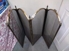 A folding fire screen. COLLECT ONLY.