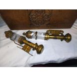 A pair of brass wall mounted candle lamps. Both A/F