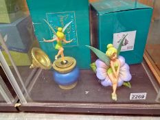 Two boxed Disney WDCC. Tinkerbell figure, Tinkerbell Inkwell, Enchanting Encounter. (Eight piece).