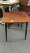 A retro teak coffee table with magazine shelf, 50 x 47 x 57 cm, COLLECT ONLY.