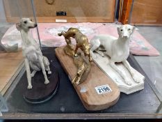 A brass dog chasing a hare and a Copeland Spode greyhound (cracked) and a resin sitting greyhound