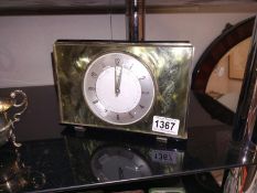 A green marble effect Metamec mantle clock.