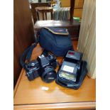 A centon DF-300 camera in case with accessories.