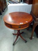 A mahogany drum top wine/tea table with two drawers. 51cm x 56cm. COLLECT ONLY.