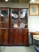 A Georgian style mahogany display cabinet with astragal glazed doors and dental cornice (98cm x 37cm