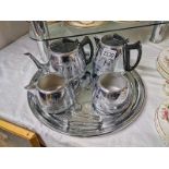 A 1960's chrome plated Swan brand Willo ware tea set designed with oriental pattern.