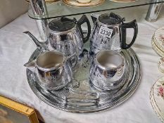 A 1960's chrome plated Swan brand Willo ware tea set designed with oriental pattern.