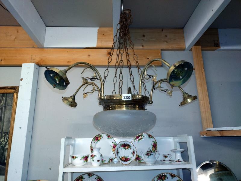 Two complete, 5 arm brass ceiling lights with large cut glass flycatcher centre shade and 3 others