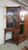 A 19/20th century mahogany astragal glazed corner cupboard on stand, 85 x 60 x 203 cm tall.