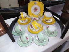 A vintage Staffordshire Chelsea tea set and four paragon floral cups and saucers