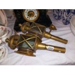 A pair of brass coach lamp style, candle lamps with one wall bracket. COLLECT ONLY.
