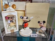 A boxed Disney Lenox, Modern Mickey, Mickey's Flowers for you, Mickey's Birthday gift and a Mickey