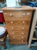 A pine six drawer chest. 57cm 37cm x height 107cm, COLLECT ONLY.