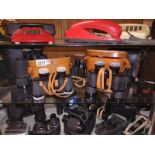 Five pairs of binoculars including Prin2 1050, Tohyoh 8X30 and three others.