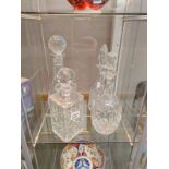 Four cut glass decanters. COLLECT ONLY.
