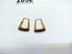Two pairs of 9ct gold hoops. (One has slight dent)