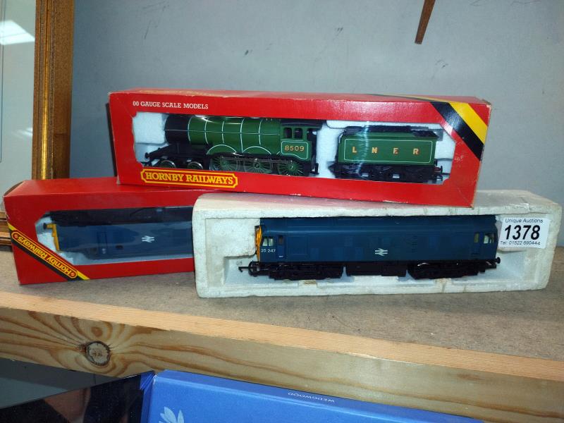 A Hornby 00 gauge R751 BR Loco, R866 LNER Biz locomotive and one other.