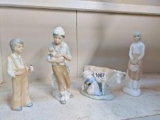 Four Lladro style figurines