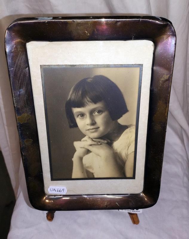 A vintage silver picture frame plus a bamboo picture frame easel. 18cm x 24cm.