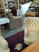 A swan neck brass standard lamp. Height 140cm. COLLECT ONLY.