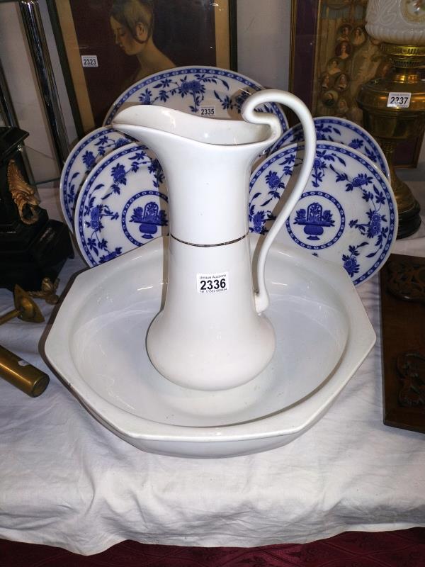 A Victorian/Edwardian white pottery wash basin and jug. COLLECT ONLY.