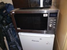 A Delonghi stainless steel microwave. COLLECT ONLY.