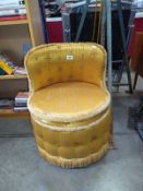 A gold fabric tub chair. COLLECT ONLY.