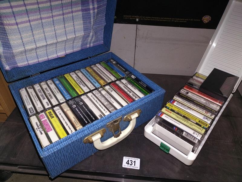 A Brexton case of cassette tapes and one other.